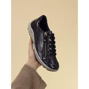 Black patent trainer